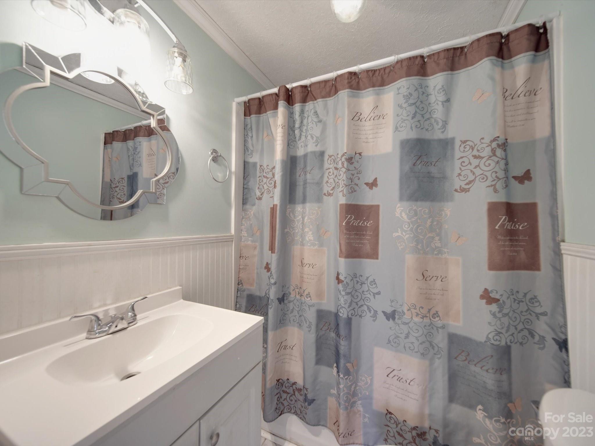 3319 Stack Road Monroe, NC 28112 - Photo 37 of 45 a bathroom with a sink and a mirror