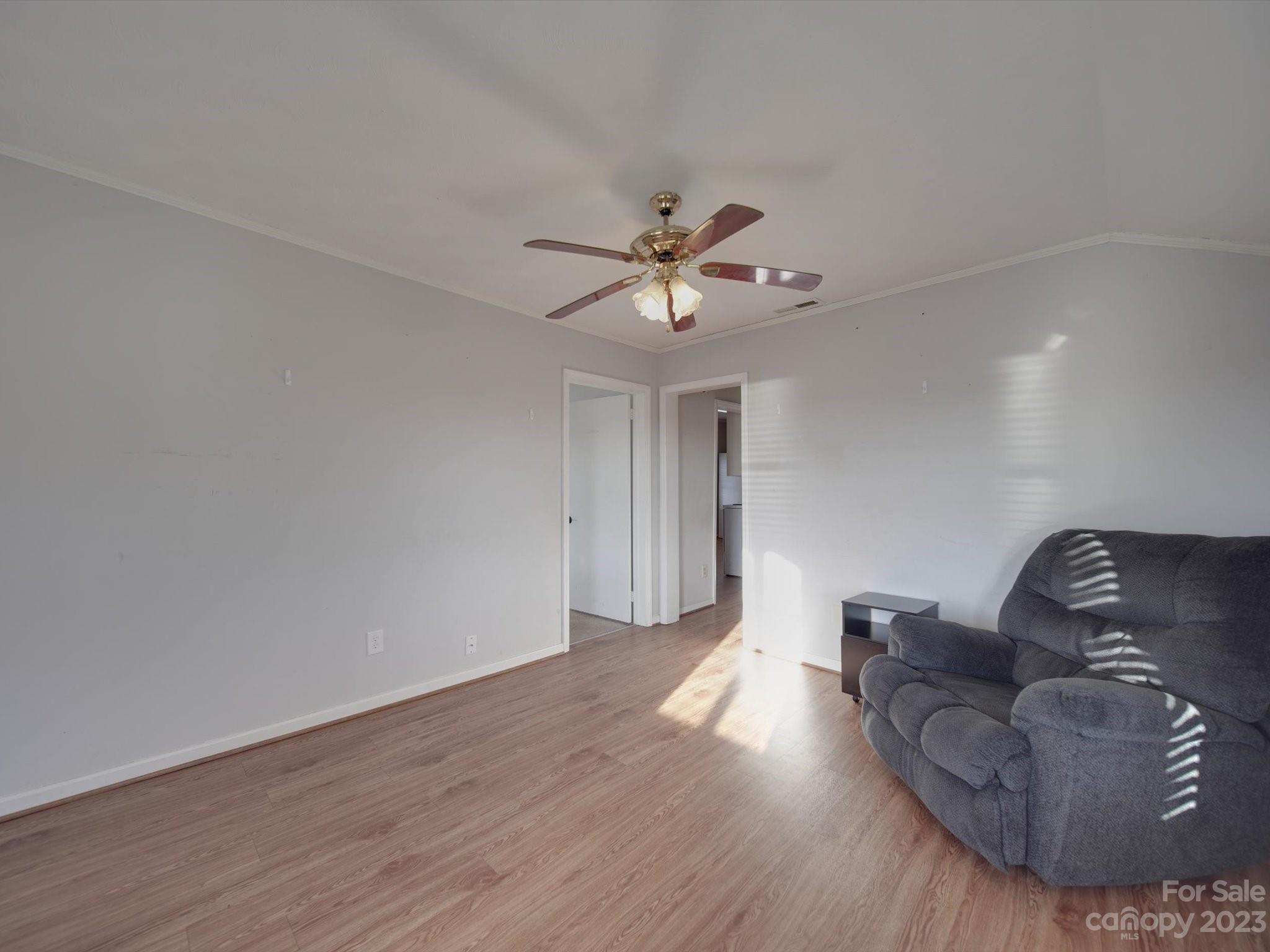 3319 Stack Road Monroe, NC 28112 - Photo 41 of 45 a living room with furniture and a ceiling fan