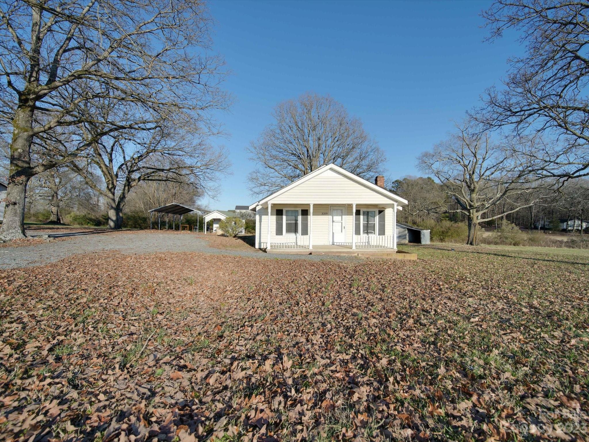 3319 Stack Road Monroe, NC 28112 - Photo 7 of 45 a front view of a house with a yard
