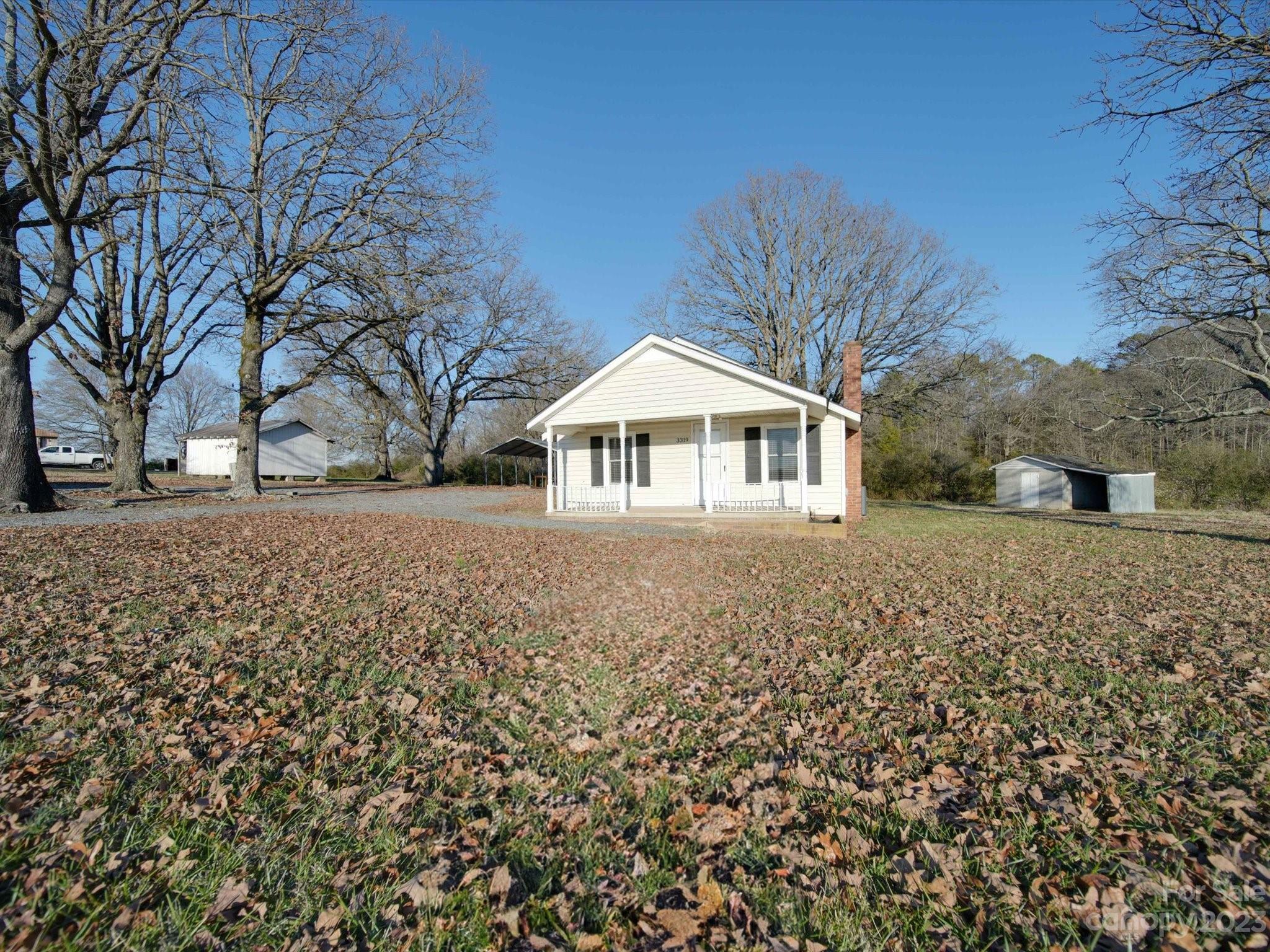 3319 Stack Road Monroe, NC 28112 - Photo 9 of 45 a front view of a house with a yard