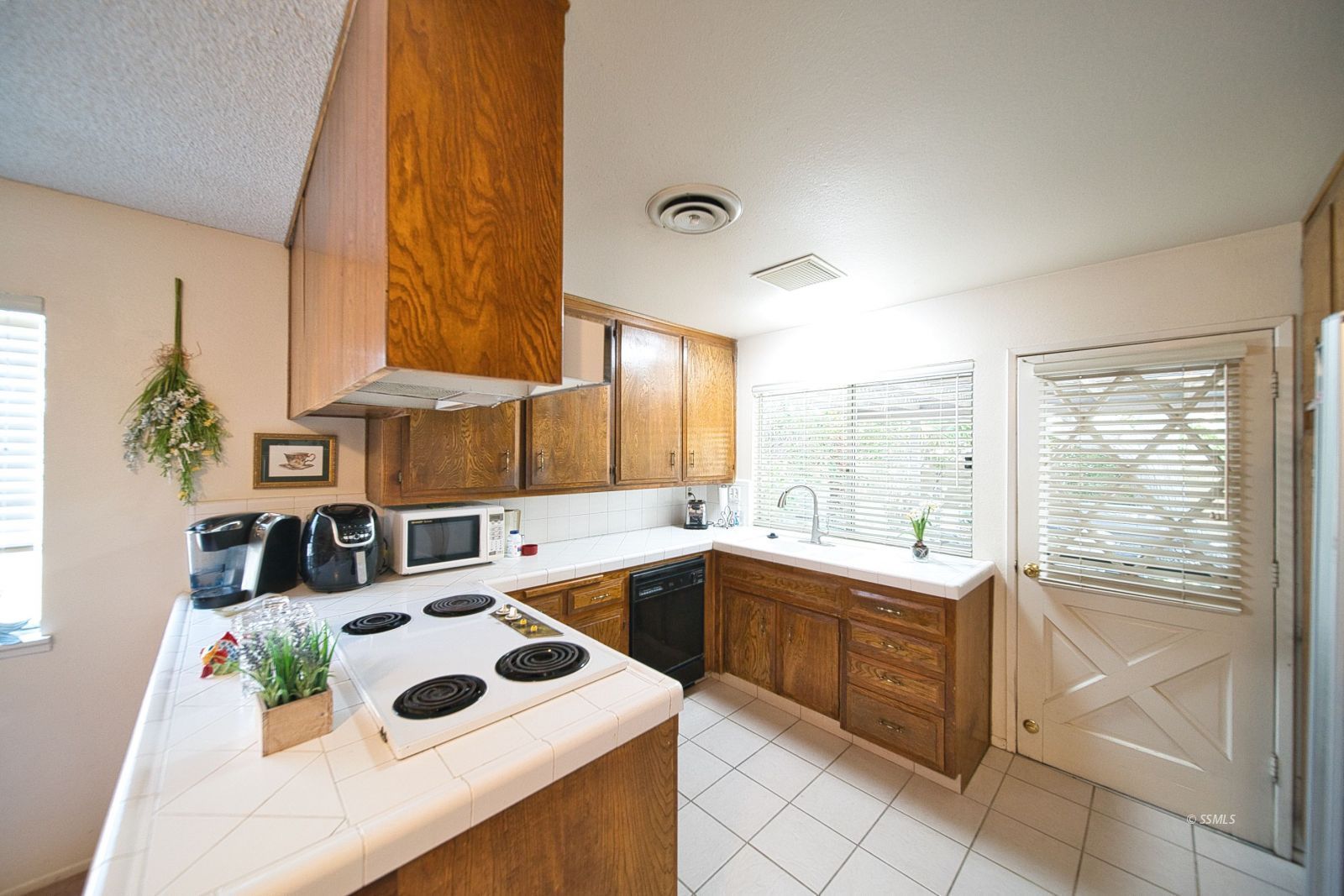 1024 Sherri Street Ridgecrest, CA 93555 - Photo 17 of 41 a kitchen with a sink and cabinets