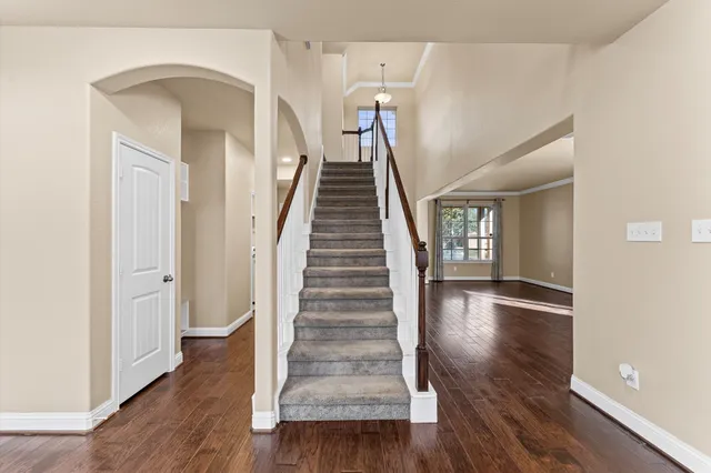 an aerial view of multiple houses with outdoor space