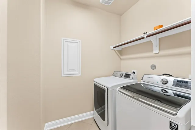 an aerial view of multiple houses with outdoor space