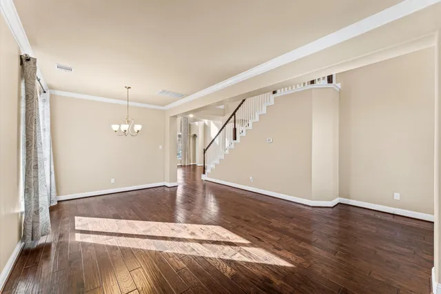 a bathroom with a granite countertop tub sink and mirror