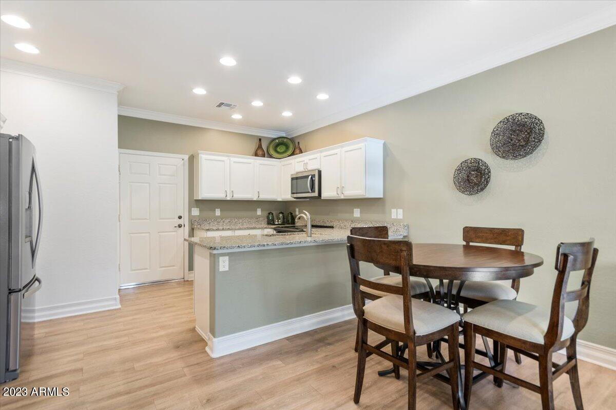 3117 South Signal Butte Road, Unit 532 Mesa, AZ 85212 - Photo 9 of 31 06-Kitchen to Dining