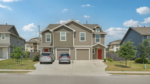 a car parked in front of a house