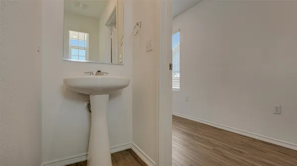 a view of kitchen with microwave oven stove and oven