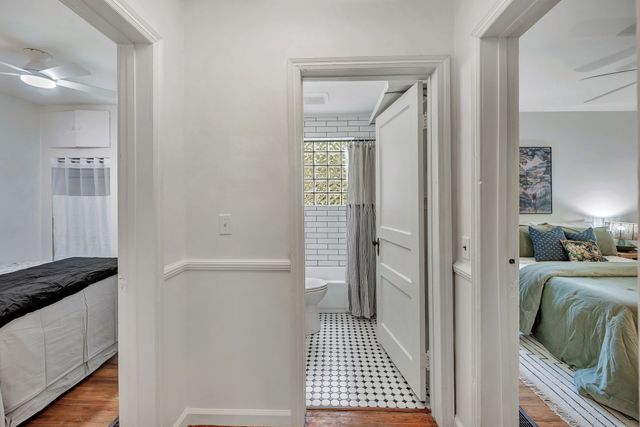 a bedroom with a bed and a walk in closet