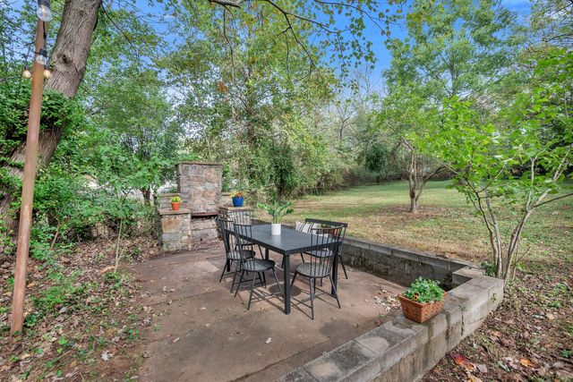 a garden view with a seating space