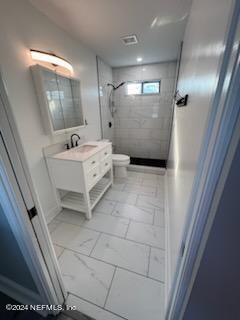 1355-1 Blackmon Road Green Cove Springs, FL 32043 - Photo 11 of 14 a bathroom with a sink a toilet a mirror and shower