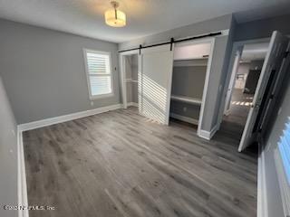1355-1 Blackmon Road Green Cove Springs, FL 32043 - Photo 6 of 14 a view of an empty room with wooden floor and a window