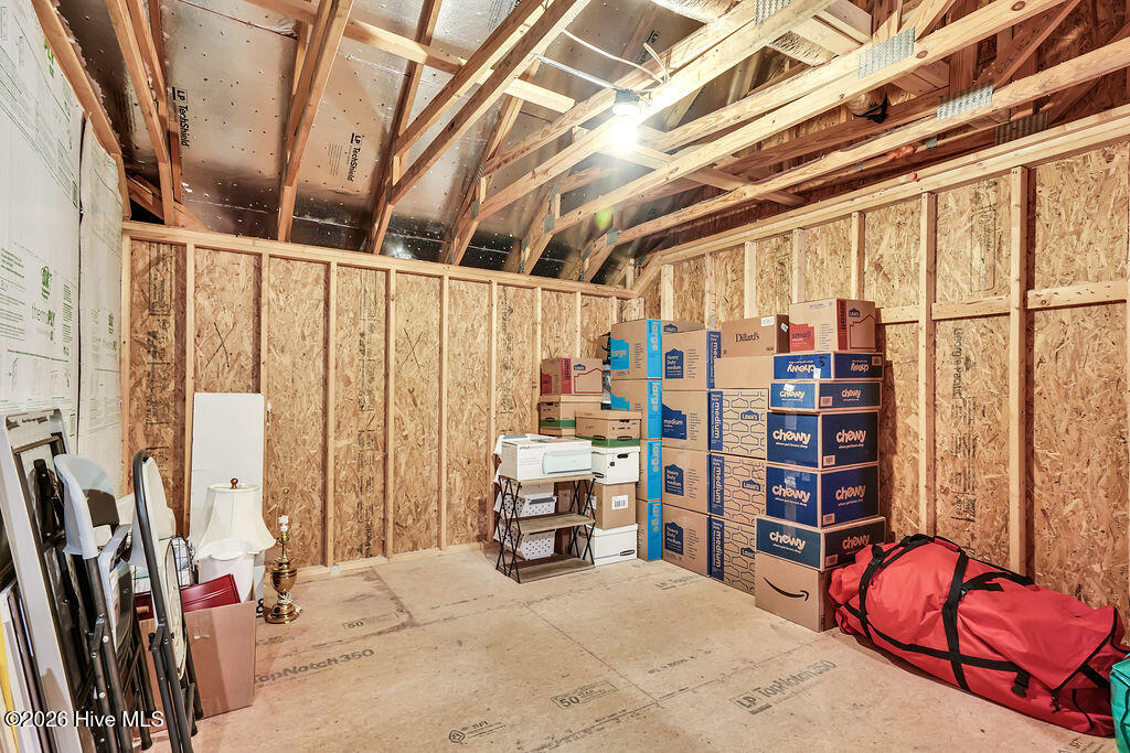 142 Rice Marsh Way Wilmington, NC 28412 - Photo 44 of 64 This incredible extensive, floored walk-out attic offers two large storage options! A 20X8 floored walk-out leads to a 14X13 area. Keep the storage or finish these for an added room.