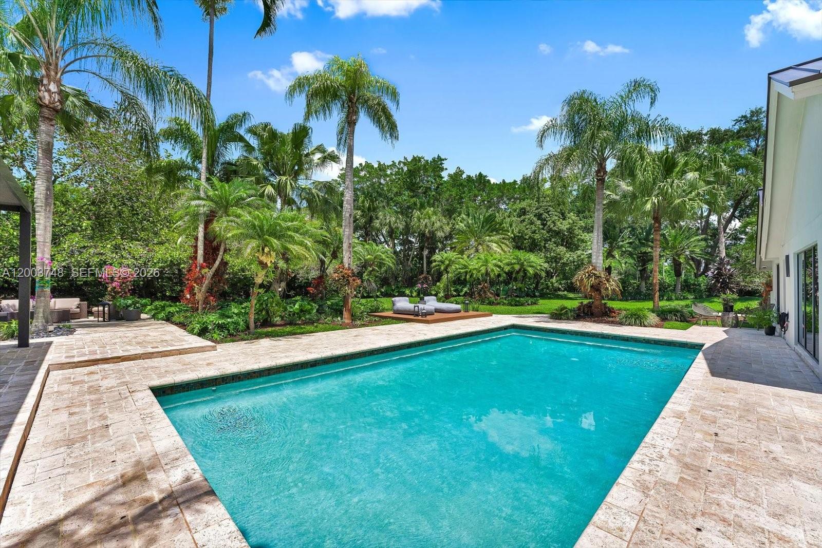 2675 Hackney Road Weston, FL 33331 - Photo 30 of 61 a view of swimming pool with garden