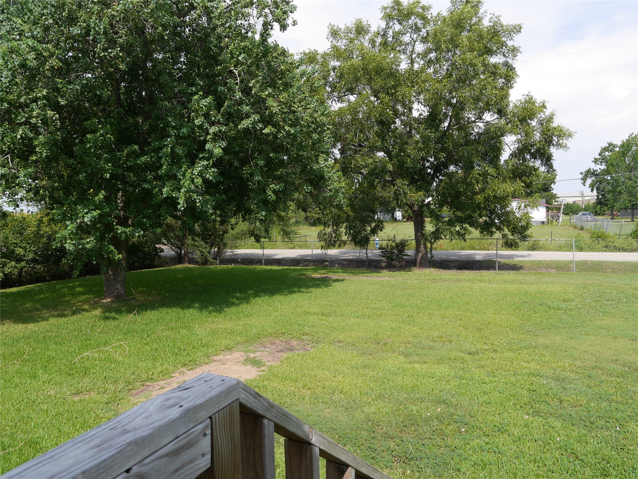 16020 1/2 Sam Brookins Street Sugar Land, TX 77498 - Photo 11 of 23 a view of outdoor space with deck and yard