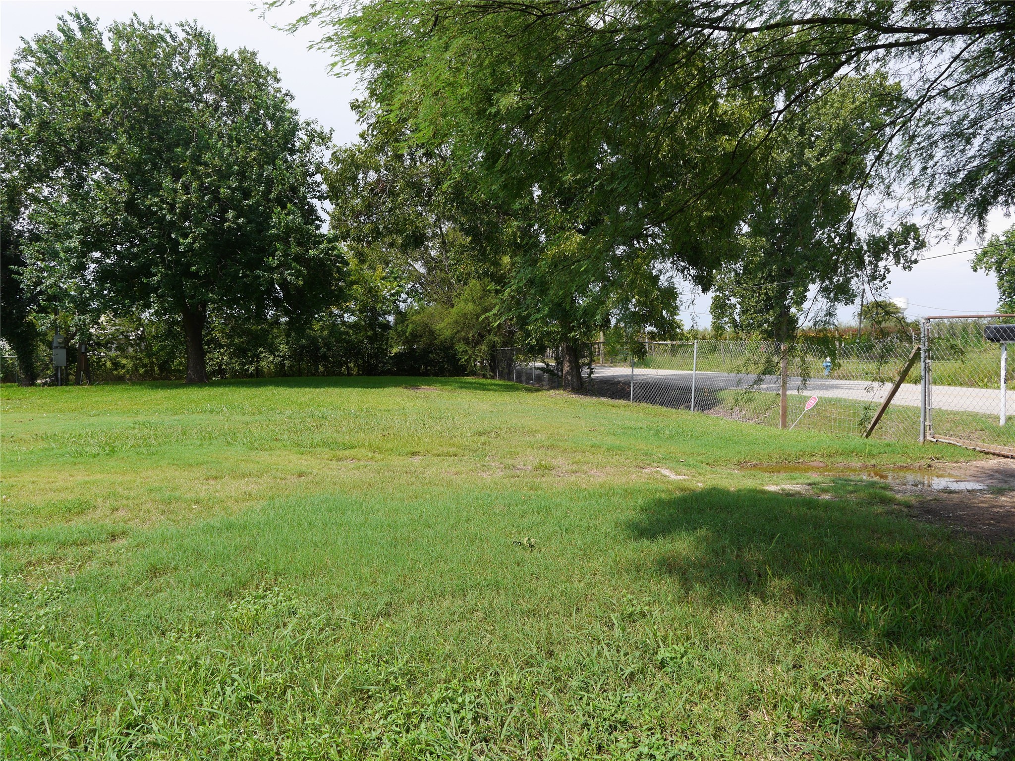 16020 1/2 Sam Brookins Street Sugar Land, TX 77498 - Photo 2 of 23 a view of a park with a tree