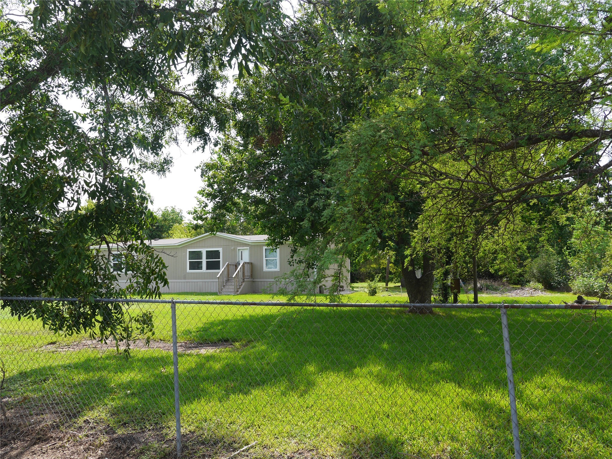 16020 1/2 Sam Brookins Street Sugar Land, TX 77498 - Photo 4 of 23 a house view with a sitting space and garden view