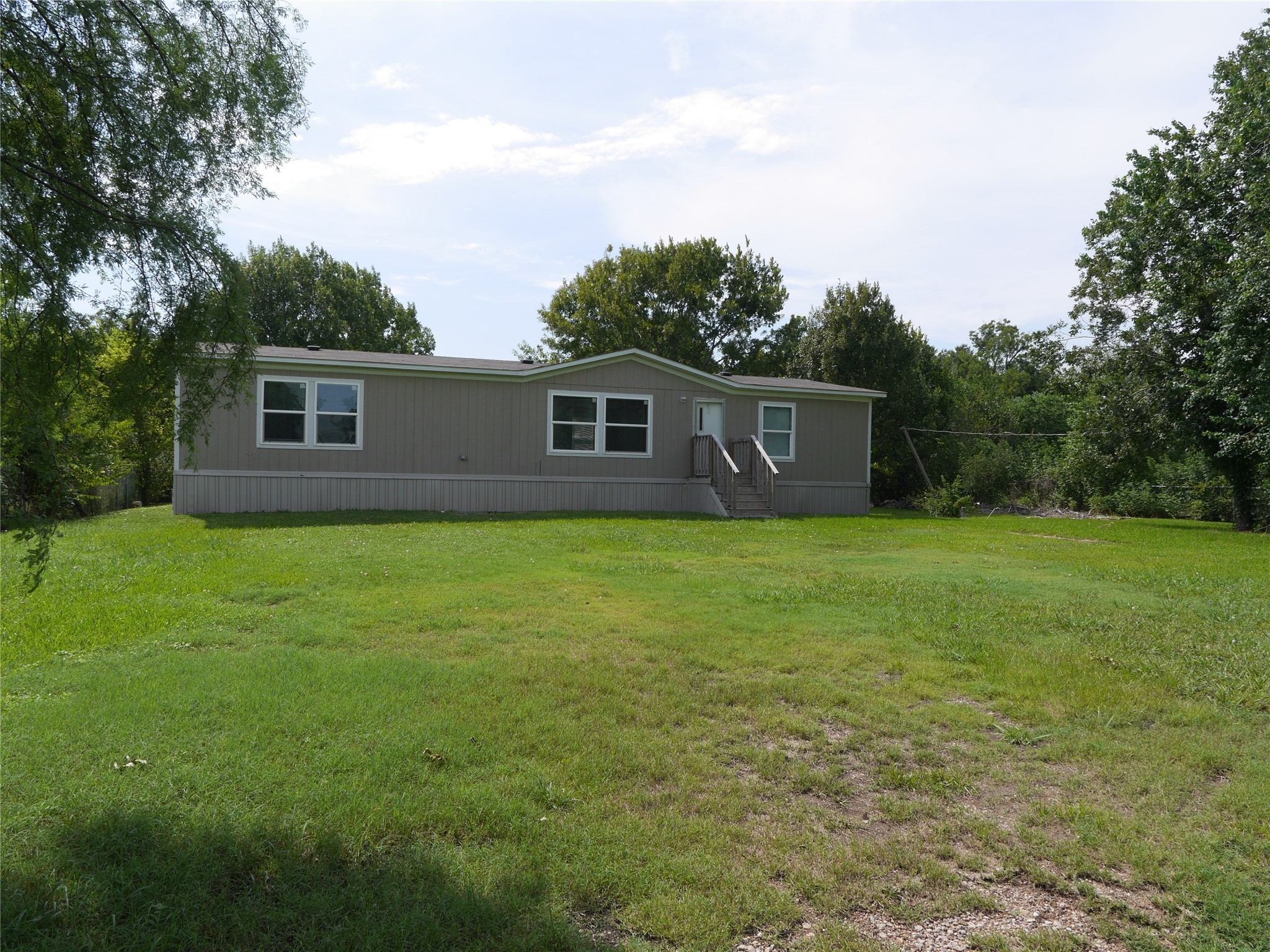 16020 1/2 Sam Brookins Street Sugar Land, TX 77498 - Photo 6 of 23 a view of house with backyard