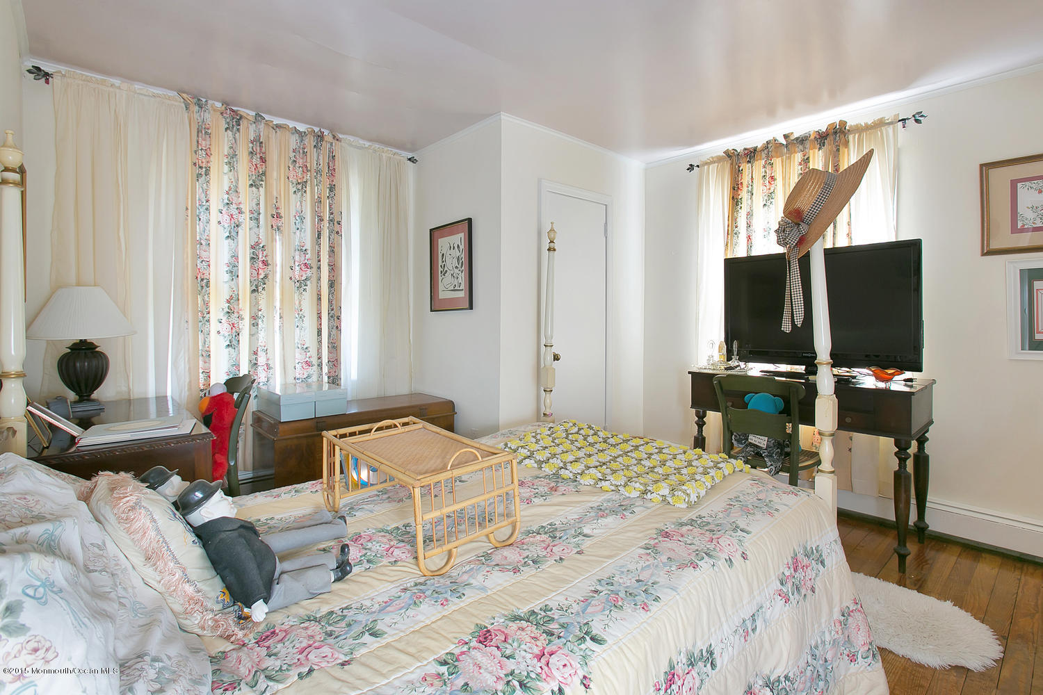 704 Schoolhouse Road Brielle, NJ 08730 - Photo 11 of 20 a bedroom with a bed and flat screen tv