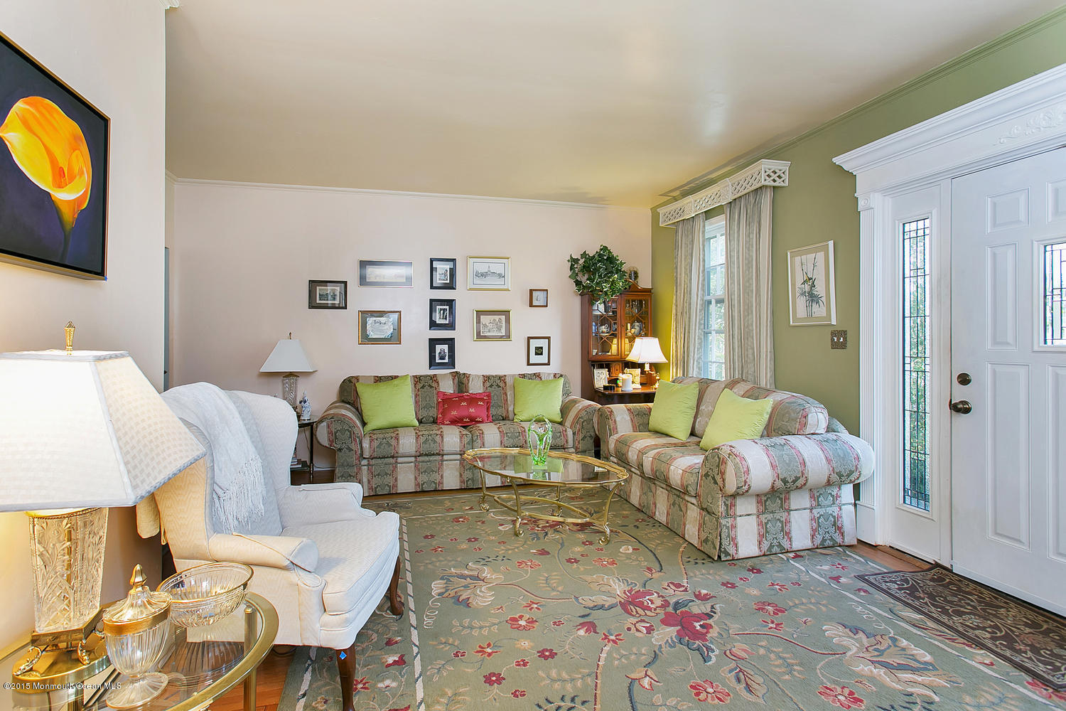 704 Schoolhouse Road Brielle, NJ 08730 - Photo 3 of 20 a living room with furniture and a flat screen tv