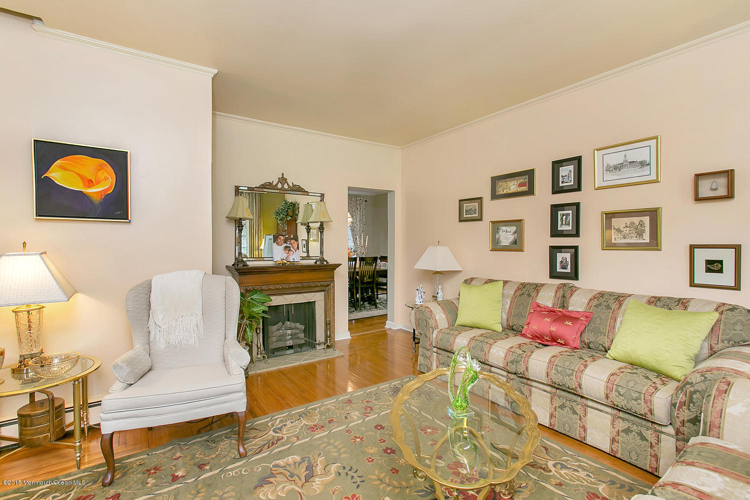 704 Schoolhouse Road Brielle, NJ 08730 - Photo 4 of 20 a living room with furniture and a fireplace