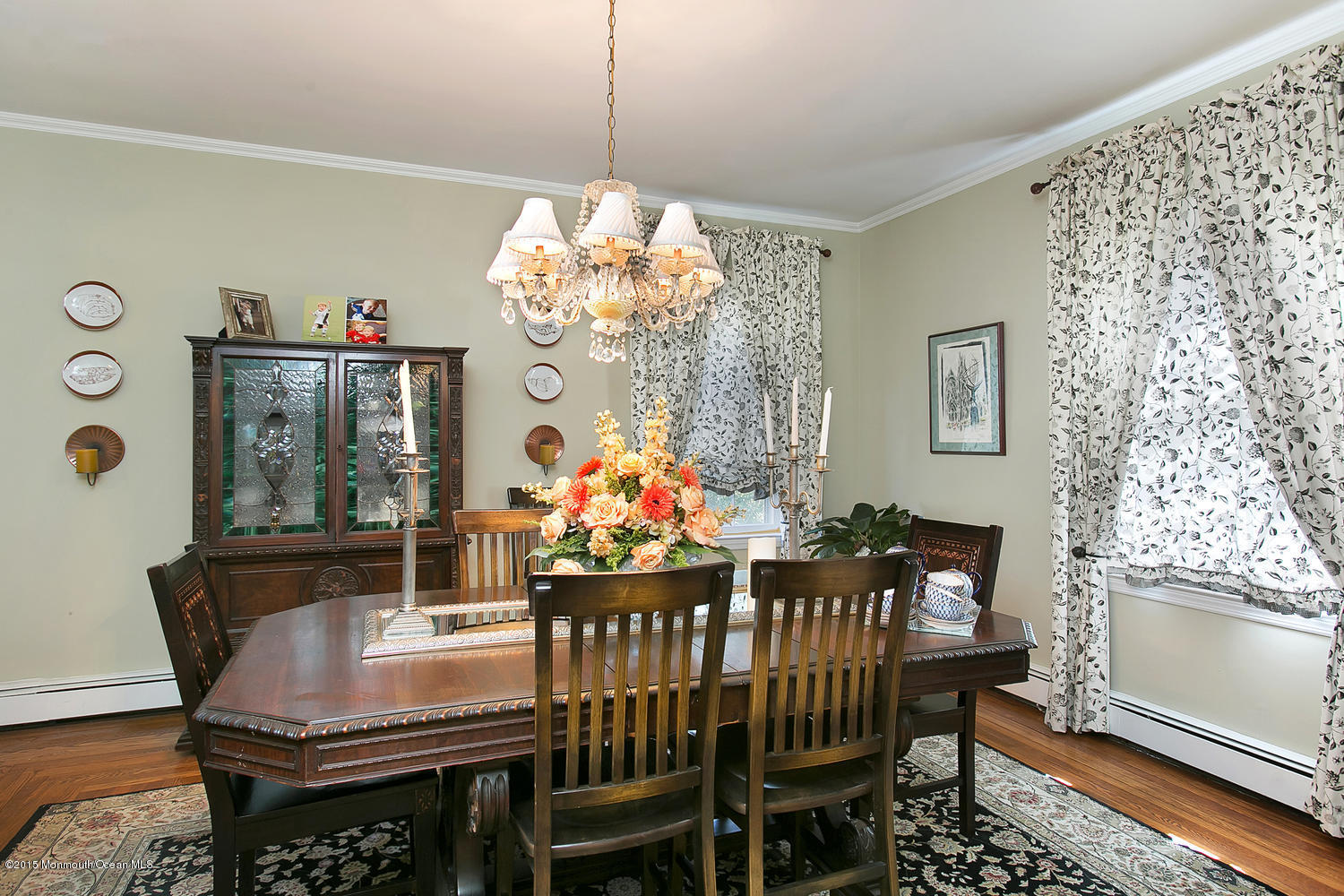 704 Schoolhouse Road Brielle, NJ 08730 - Photo 6 of 20 a view of a dining room with furniture wooden floor and chandelier
