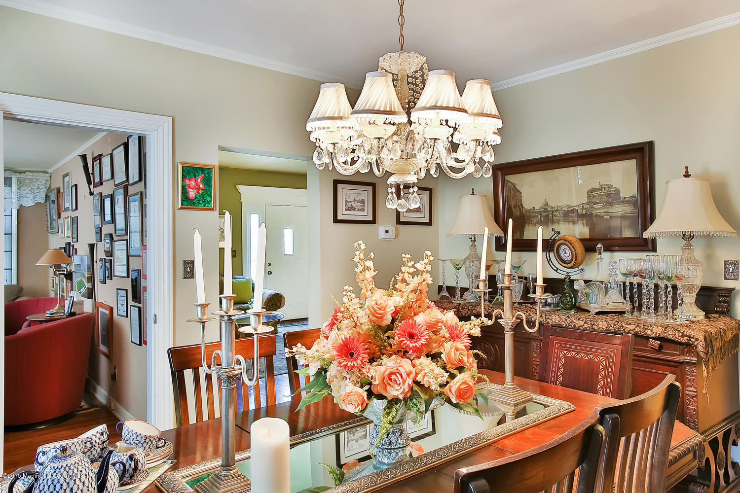 704 Schoolhouse Road Brielle, NJ 08730 - Photo 7 of 20 a view of a dining room with furniture and chandelier
