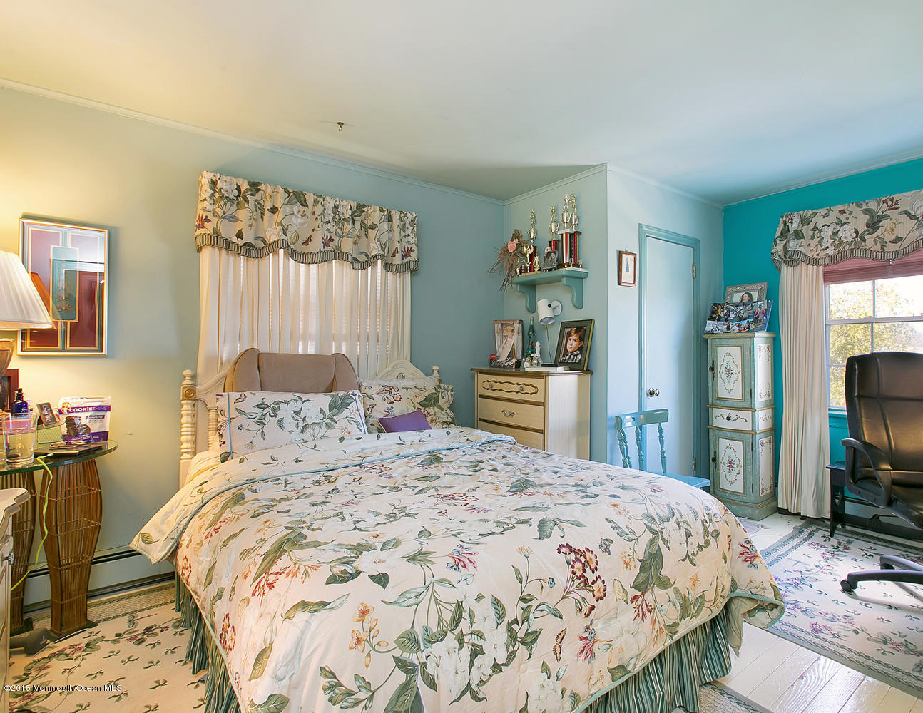 704 Schoolhouse Road Brielle, NJ 08730 - Photo 10 of 20 a bedroom with a bed a dresser and book shelf