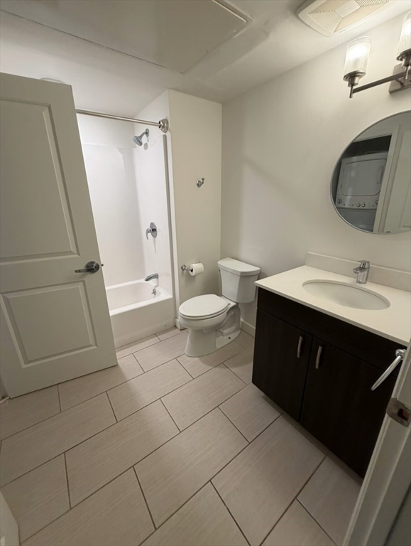 10 Myrtle Street, Unit 51B Waltham, MA 02453 - Photo 9 of 11 a bathroom with a sink a toilet and a mirror