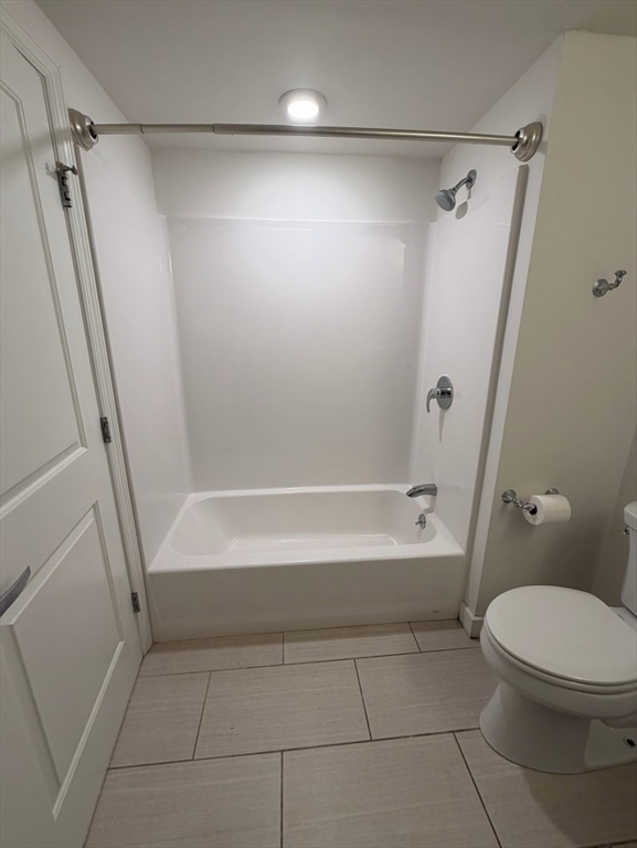 10 Myrtle Street, Unit 51B Waltham, MA 02453 - Photo 10 of 11 a bathroom with a bathtub and a shower