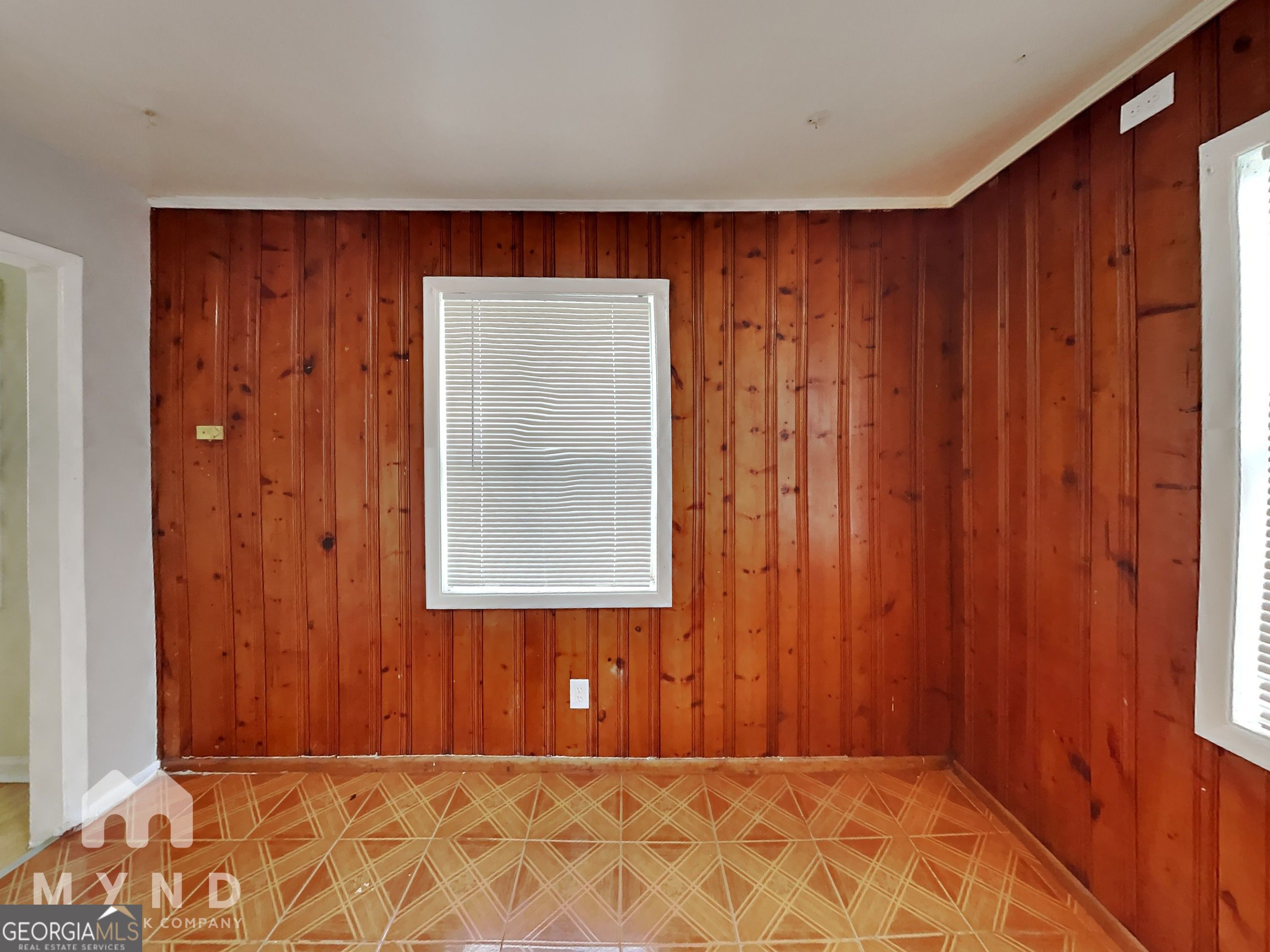 730 Hill Street Forest Park, GA 30297 - Photo 3 of 12 a view of a room with a wooden door