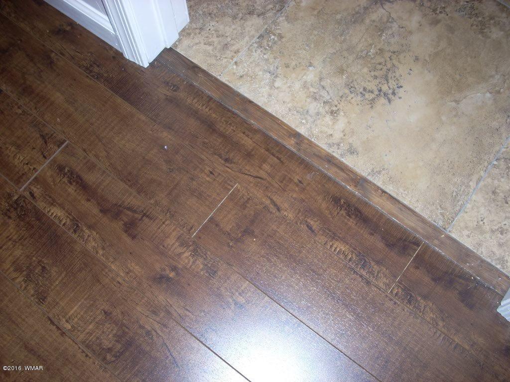2975 East Lookout Lane Overgaard, AZ 85933 - Photo 20 of 34 a view of wooden floor and a road