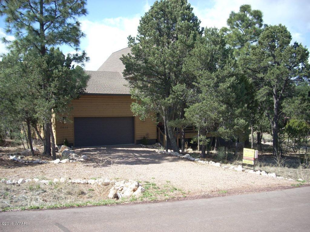 2975 East Lookout Lane Overgaard, AZ 85933 - Photo 2 of 34 a view of house with snow on the road