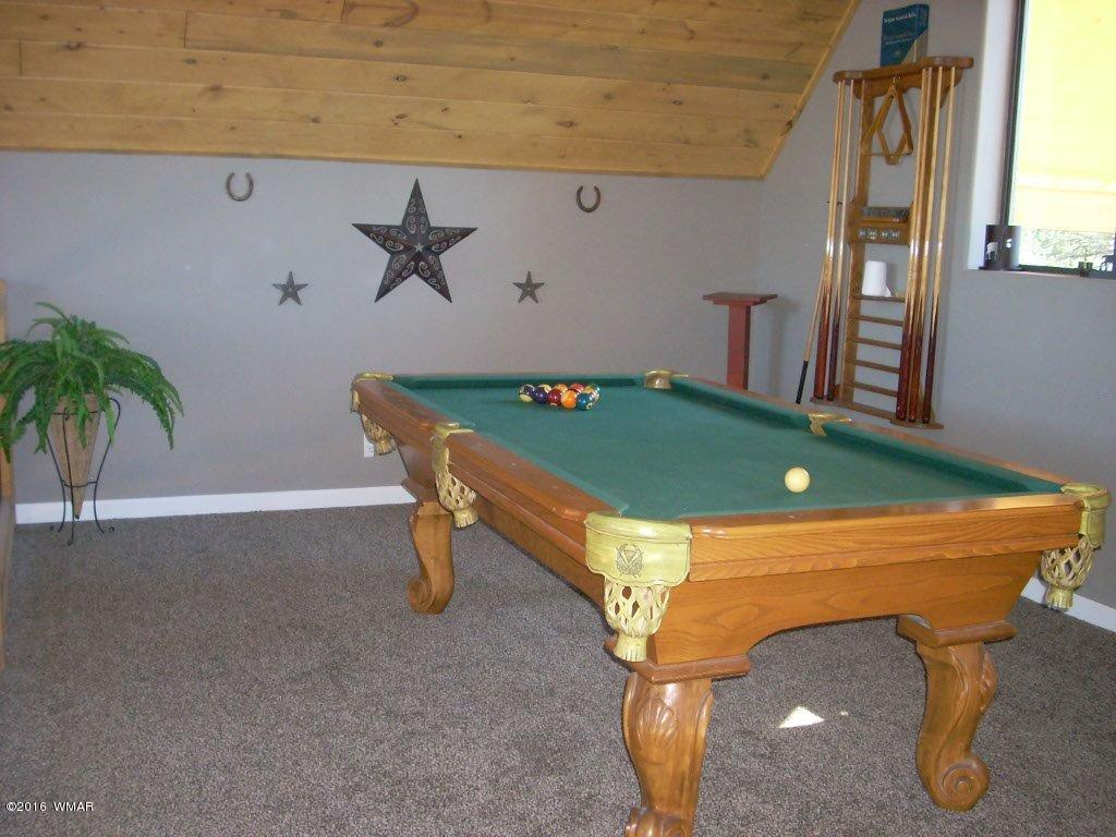 2975 East Lookout Lane Overgaard, AZ 85933 - Photo 23 of 34 a room with pool table and windows