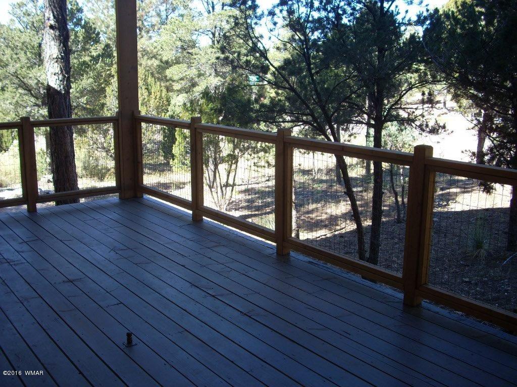 2975 East Lookout Lane Overgaard, AZ 85933 - Photo 3 of 34 a view of an entryway with wooden floor