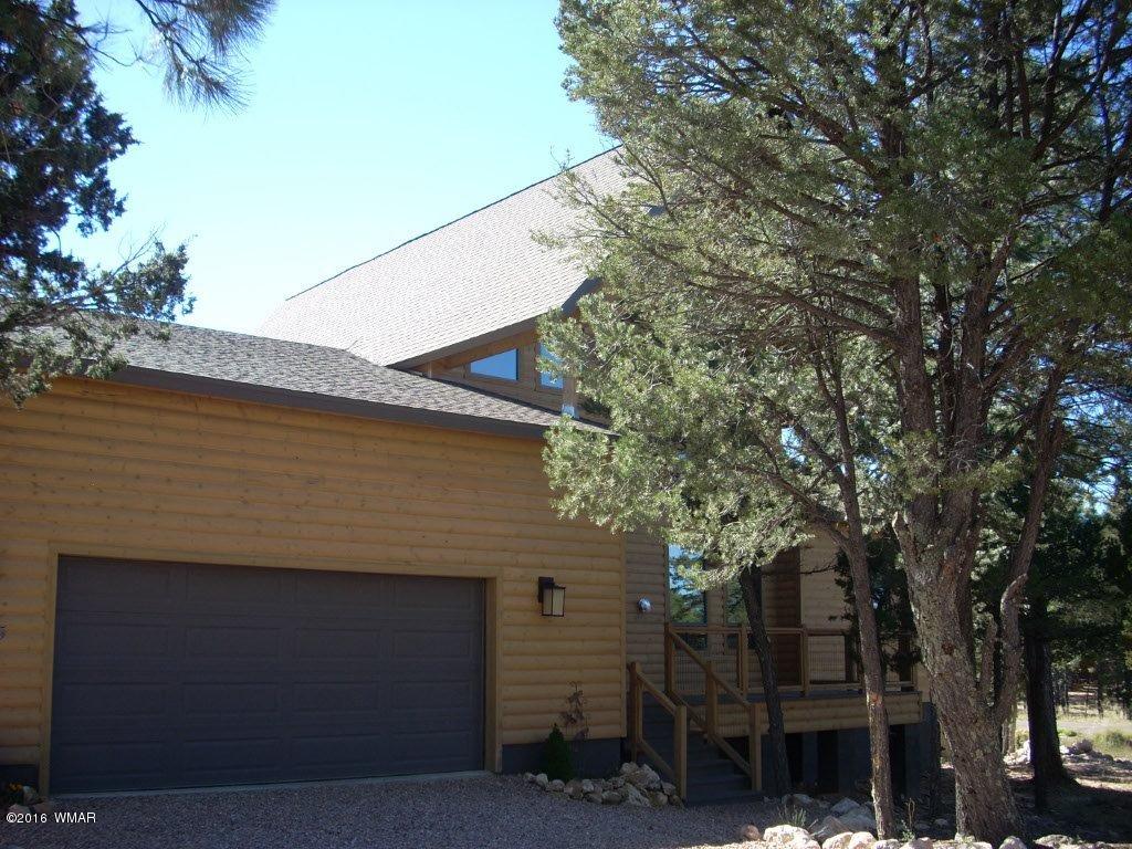 2975 East Lookout Lane Overgaard, AZ 85933 - Photo 10 of 34 a view of a house with a tree