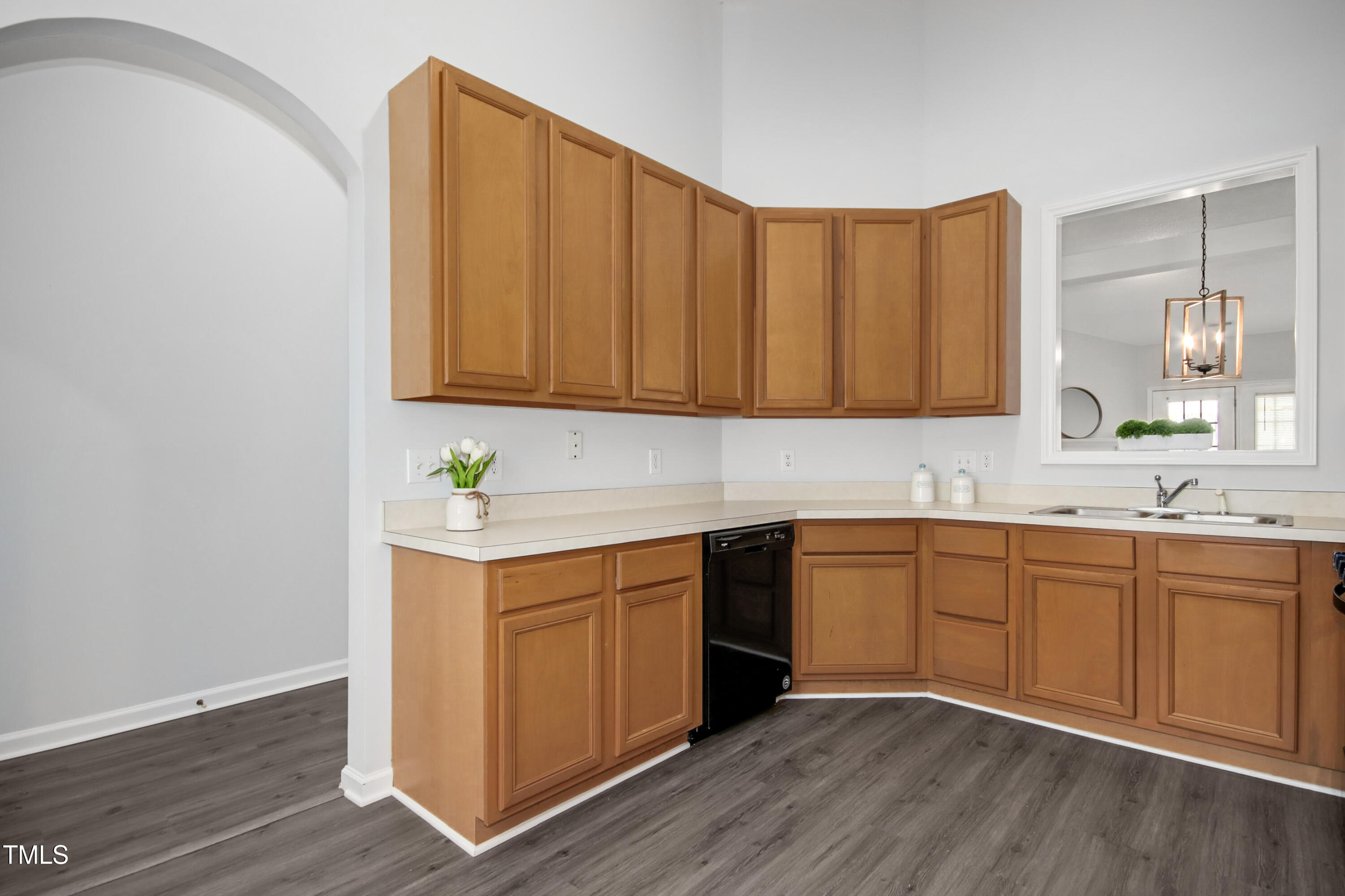 4432 Cottage Stone Drive Raleigh, NC 27616 - Photo 5 of 15 Kitchen and arched doorway
