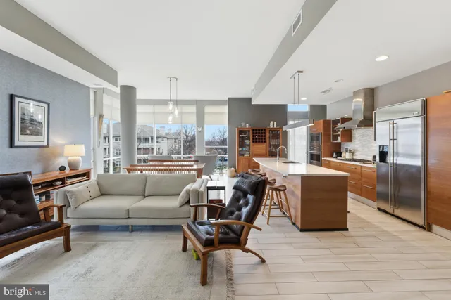 a balcony with table and chairs
