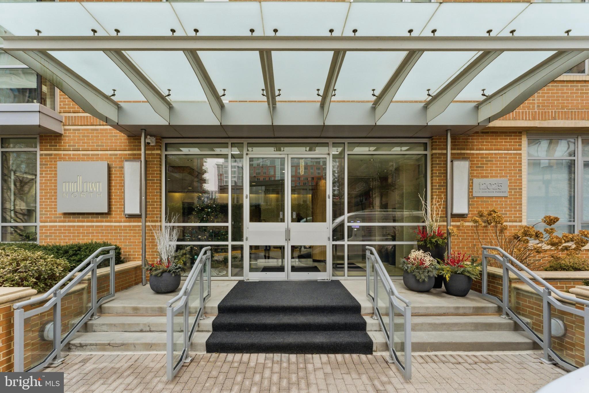 12025 New Dominion Parkway, Unit 103 Reston, VA 20190 - Photo 36 of 47 a view of a balcony with car parked