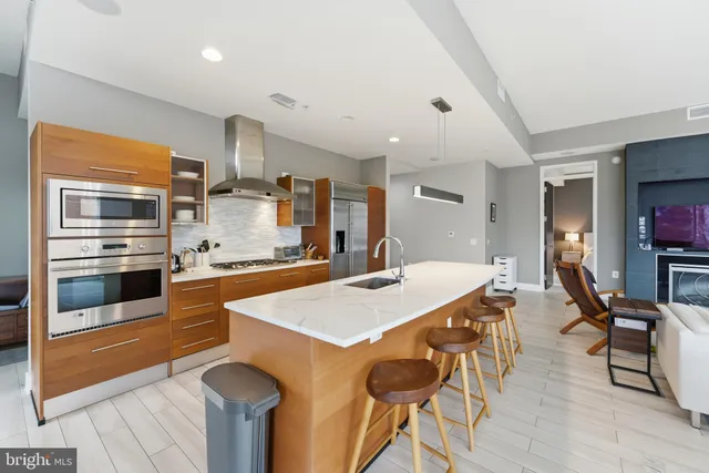 a bedroom with a large bed and a view of bedroom