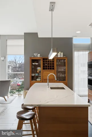 a view of a hallway with washer and dryer