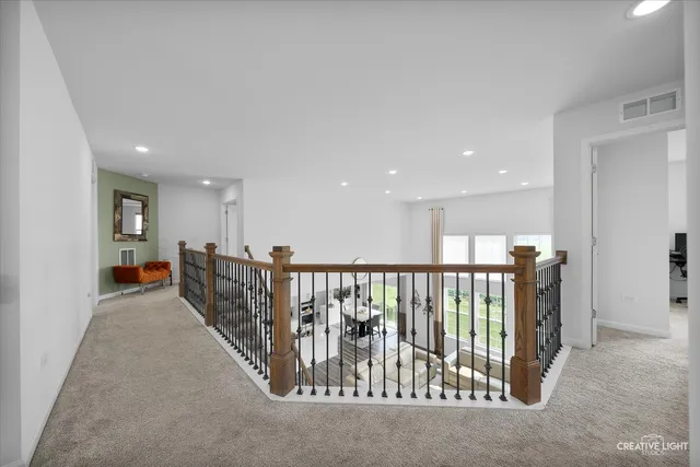 a view of a hallway with workspace