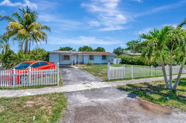 a view of a backyard with a garden