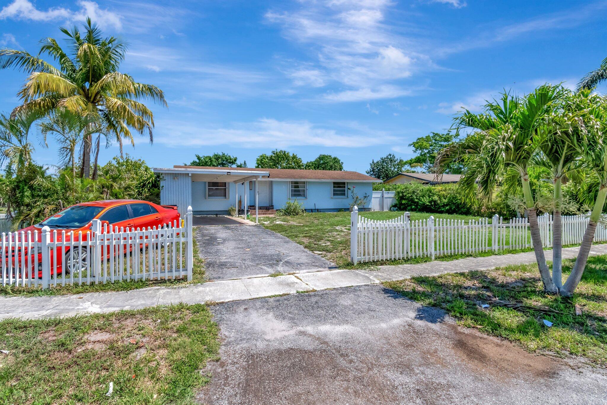 a view of a backyard with a garden
