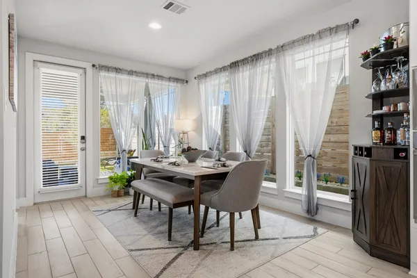 a view of a dining room kitchen and furniture