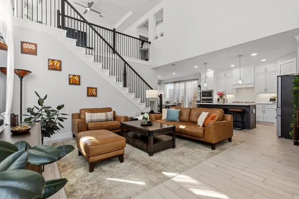 a view of a livingroom with furniture and outside view