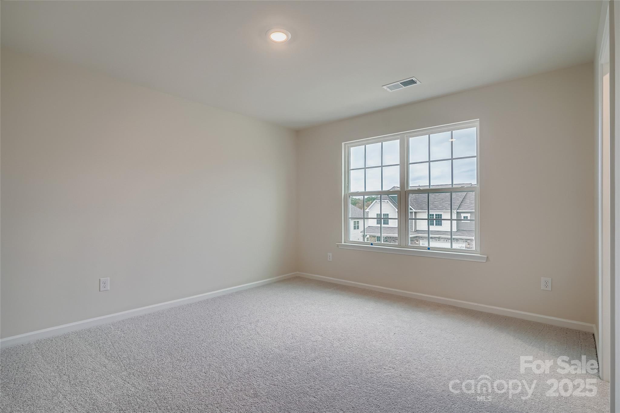 4344 Shimmering Stone Way Maiden, NC 28650 - Photo 12 of 13 an empty room with a window