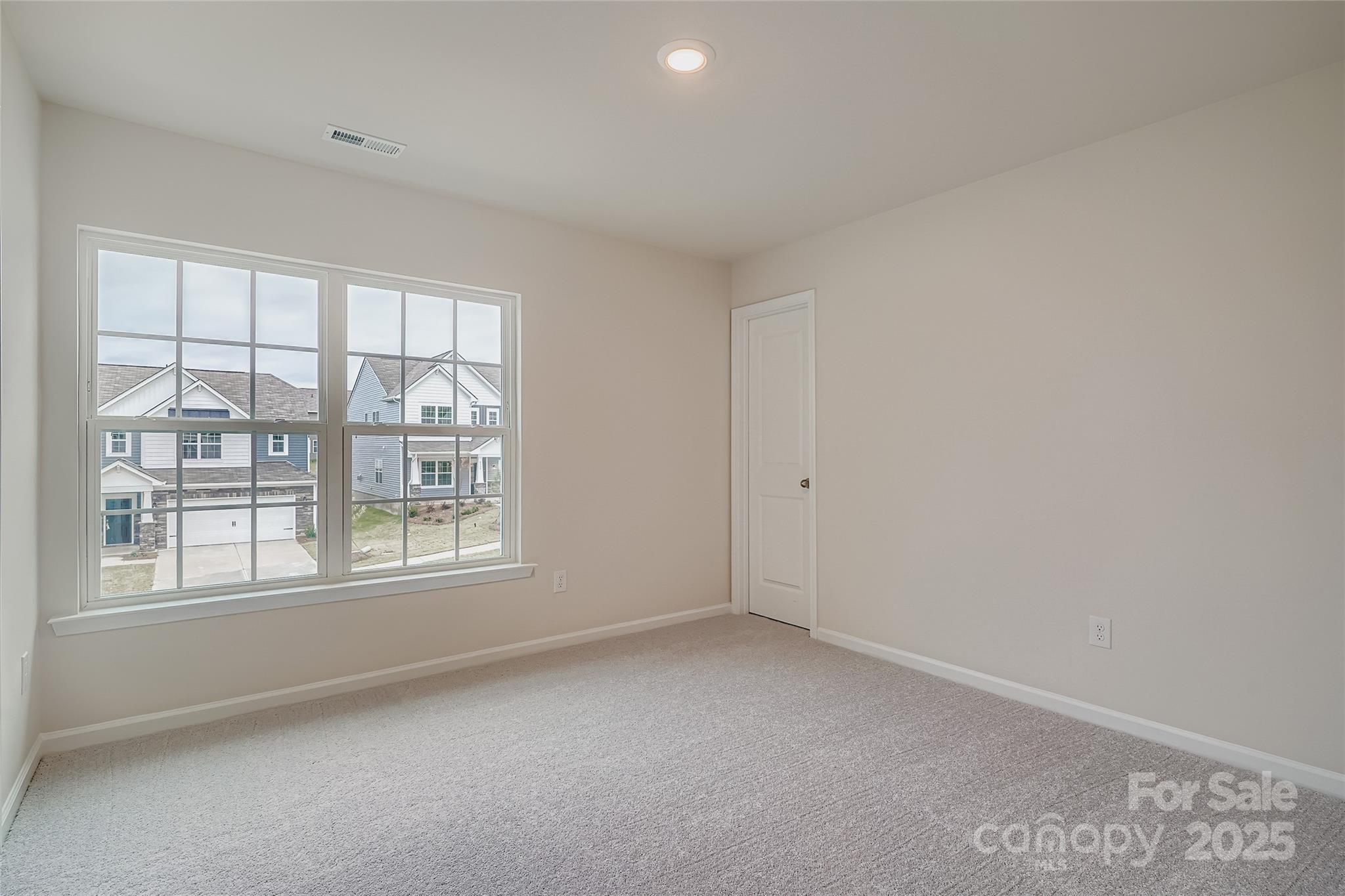4344 Shimmering Stone Way Maiden, NC 28650 - Photo 10 of 13 an empty room with a window