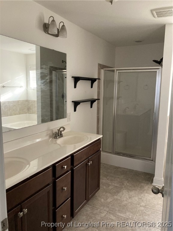 270 Stonebriar Avenue Raeford, NC 28376 - Photo 19 of 26 a bathroom with a sink a mirror and shower