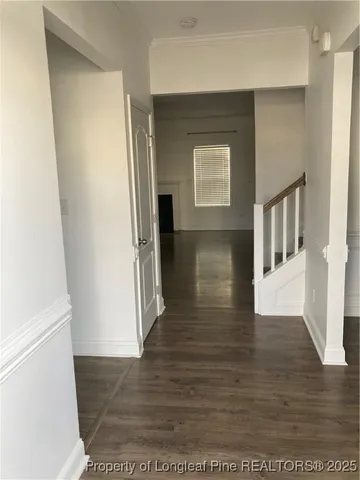 a view of hallway with livingroom
