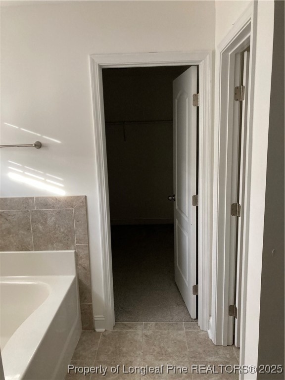 270 Stonebriar Avenue Raeford, NC 28376 - Photo 20 of 26 a bathroom with a bathtub and a shower